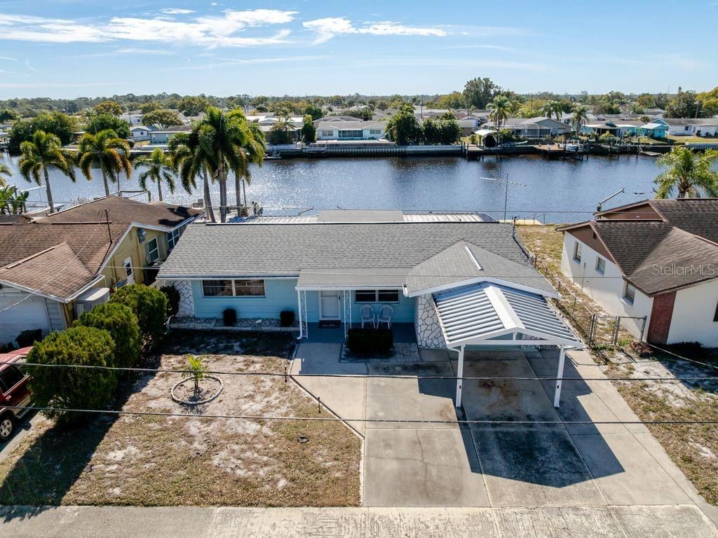 Photo of 5644 Riddle Road, Holiday, FL 34690 (MLS # TB8463359)