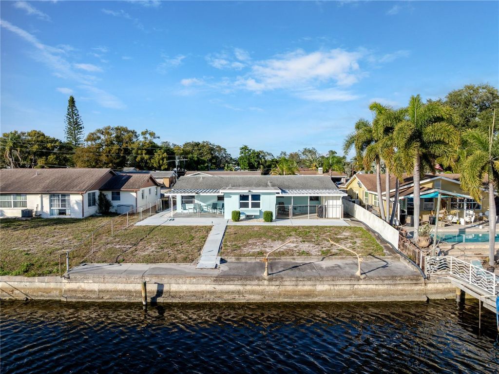 Photo of 5644 Riddle Road, Holiday, FL 34690 (MLS # TB8463359)