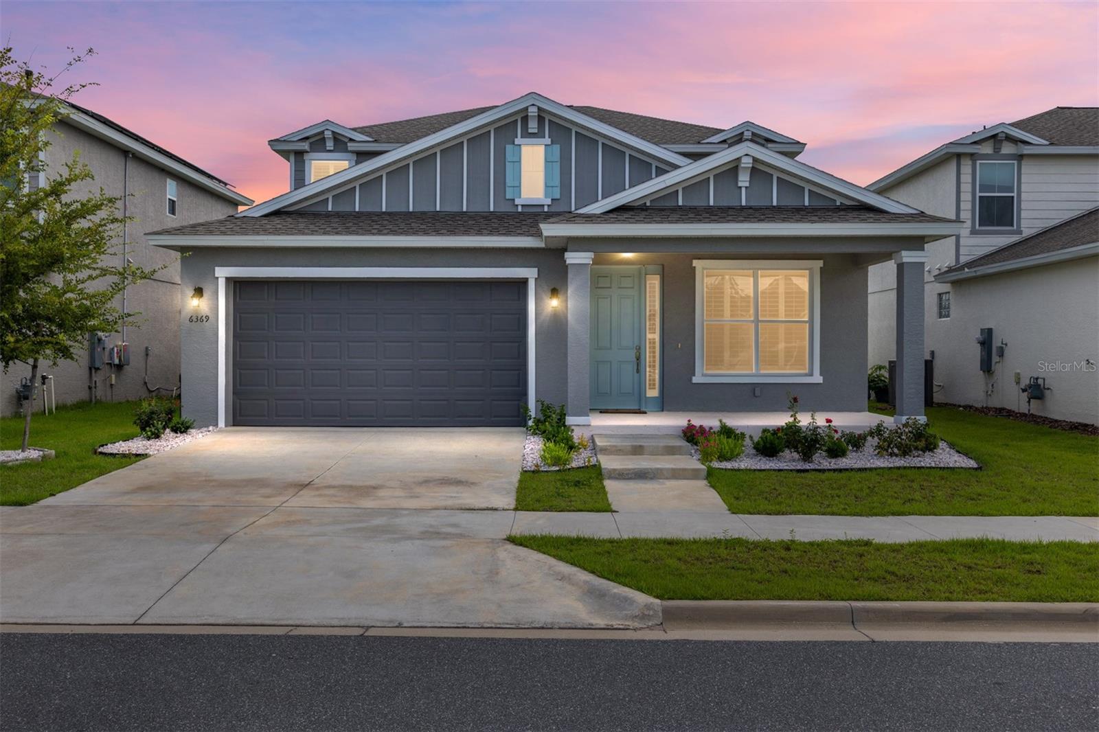 One or more photo(s) has been virtually staged. Welcome to this beautifully upgraded Sable model in the heart of Calesa Township, one of Ocala's most sought-after master-planned communities. With 2,480 square feet of thoughtfully designed space, this home offers four bedrooms, two and a half bathrooms, a versatile loft, and multiple living areas perfectly suited for modern family life. From the moment you step inside, you'll appreciate the stylish tile entryway that flows into a bright and open layout. The front flex room, finished with carpet and plantation shutters, makes an ideal formal seating area, office, or study. The main living room features soft carpeting, a ceiling fan, and sliding doors that open to a screened, tiled lanai- an ideal space for outdoor dining or relaxing in privacy. The kitchen is equally impressive, showcasing white cabinets, granite countertops, and black appliances. A walk-in pantry provides ample storage, and the adjacent laundry room includes tile floors, shelving, and a matching white washer and dryer. The first-floor primary suite offers a peaceful retreat with plush carpet, a ceiling fan, two windows for natural light, and a generous walk-in closet. The ensuite bathroom features tile flooring, a glass-enclosed tiled shower, a linen closet, and dual quartz sinks set in a spacious vanity. Upstairs, you'll find a large loft with a ceiling fan and additional storage ideal for a playroom, media area, or home gym. Three generously sized guest bedrooms, each with carpet, ceiling fans, and blinds, share a full bath with quartz double sinks, a tub/shower combo, tile flooring, and its own linen closet. A convenient half bath is located downstairs, also with quartz vanity and tile floors. Additional highlights include a two-car garage with built-in shelving, plantation shutters throughout the main living spaces, a white vinyl privacy fence with gate, and rock landscaping surrounding the home. The home includes a water softener system, a single HVAC unit, with a 10-year transferable builder warranty for peace of mind. Living in Calesa Township means access to top-tier amenities, including miles of walking and fitness trails, resort-style pools, soccer fields, splash pads, dog parks, and playgrounds. Residents also enjoy the FAST Aquatic Center and the on-site Ina A. Colen Academy, a tuition-free K-8 charter school. The community's gated, family-focused design ensures both safety and a strong sense of neighborhood connection. This move-in ready Sable model is a rare opportunity to enjoy style, space, and lifestyle in one of Ocala's most dynamic new developments. Schedule your tour today! This one won't last long!