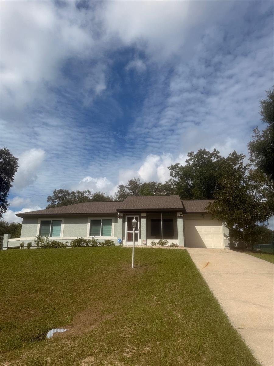 Rare find! Move-In-Ready! Totally renovated between 2020 & 2023. Sold Unfurnished. Completely fenced, spacious 1360 Living SQFT, 1891 Total SQFT, 3/2 ranch house. Many architectural features! Vaulted high ceilings with New Beans installed. New Roof, New Air Conditioner, New Water Heater, New Windows, New Tile Floors thru-out, Exterior+Interior painted, renovated kitchen with shiplap features, New Shaker Cabinets, New quartz countertops, New appliances, New Cabinets, New Sink & New plumbing. Bedrooms have designer’s shiplap walls. Bathrooms completely renovated, new granite countertops, Master bathroom with shower. Guest bathroom has a Jacuzzi Style Tub with jets. Front Patio & Backyard Patios adds about 266 SQFt to the house. The 3rd bedroom used as a Laundry Room can be easily converted back to a bedroom. Garage has new extra Insulation, New epoxy floor installed & has a spacious built-in closet. Big lot close to half an acre with .44 acres. Large metal shed included in excellent condition. House has Public Water & Public Sewer. HOA is $12 Monthly includes Garbage & Landscaping pickup once weekly for each, maintenance of lakes & park. Residents can join Silver Springs Shores Community to use Pools, Gym & other amenities for $5/ year. Major Stores are about a 5 minute drive. Community park up the street. Two lakes & lots of surrounding nature. A new school is being built approximately several blocks away. There is a side walk directly across the street & there are street lights.