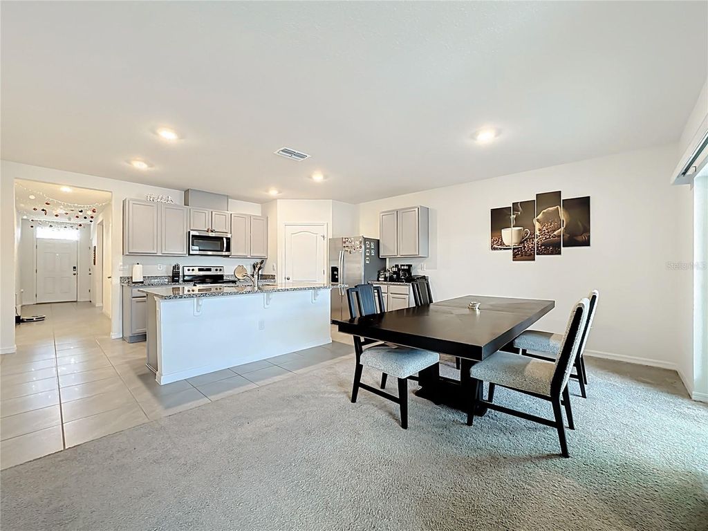 Photo of 1519 Wax Myrtle Way, Haines City, FL 33844 (MLS # O6374725)