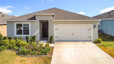 Photo of 1519 Wax Myrtle Way, Haines City, FL 33844 (MLS # O6374725)