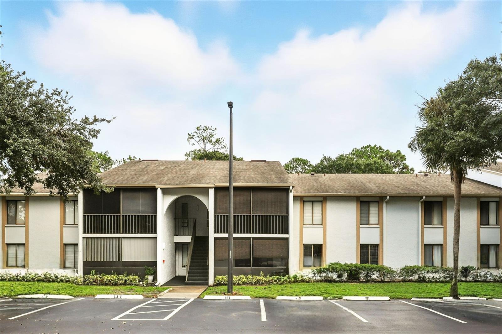 Come view this first-floor 2 bed/2 bath condo in The Club at Orlando’s gated community. Located within minutes of several restaurants, shopping, parks, Valencia Community College East, and Full Sail University, with easy access to highways 408 and 417. Inside, you'll find a spacious floor plan with plenty of natural light featuring tile flooring throughout. The kitchen has an eat-in dining area, closet pantry, and a barstool countertop. Screened patio off the spacious living/dining area. Master bedroom has its own en-suite bathroom and WIC. Laundry room for added convenience. Amenities include a large community pool, spa, tennis courts, car wash area, club house, and walking trails. Available now. $95 non-refundable application fee per applicant. Small pet is OK with $350 deposit ($150 refundable). Qualifications: Income 3X rent, credit score of 700 plus, and background checks. Equal Opportunity Housing.