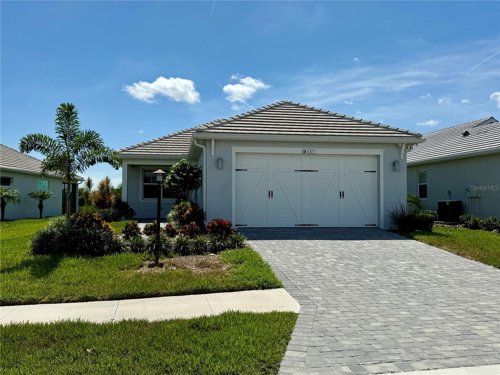 Live the Waterside lifestyle in this beautifully designed 2-bedroom + den, 2-bath single-family home in sought-after LakeHouse Cove. Available for a 12-month lease, this 2023-built former model by Homes by Towne offers high-end finishes, hurricane impact windows, smart-home features, and a thoughtfully designed floor plan—ideal for full-time living.
The dedicated home office includes custom built-ins and dual workspaces, perfect for remote professionals. The kitchen features upgraded quartz countertops, stainless steel appliances, and gas cooking. Tray ceilings, crown molding, designer flooring, and a spacious lanai complete the elevated interior.
Enjoy peaceful mornings with sunrise views over protected wetlands. Located just minutes from Waterside Place, residents can enjoy food truck nights, a weekly farmers market, parks, lakefront dining, and more.
Unfurnished. Annual lease only. Lawn care included. Pets considered with approval.