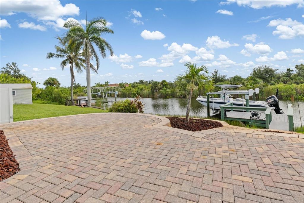 Photo of 9540 Galaxie Circle, Port Charlotte, FL 33981 (MLS # C7514066)