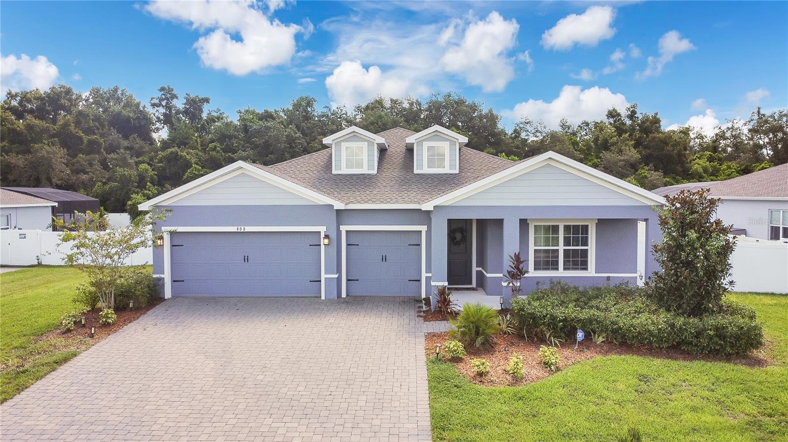 Discover your perfect home at 808 Rominger Loop, Apopka, FL! Nestled on one of the best lots in the neighborhood, this stunning residence offers unmatched privacy with no backyard neighbors. Step inside to an inviting open floor plan, accentuated by soaring high ceilings that create a bright, airy atmosphere. Spacious, large-sized rooms provide ample room for comfort and versatility, ideal for modern living. The oversized yard is perfect for outdoor activities, gardening, or future expansions, while the charming screened-in patio offers a serene spot to enjoy Florida’s beautiful weather year-round. Don’t miss this rare gem combining luxury, space, and an unbeatable location! Schedule your tour today!