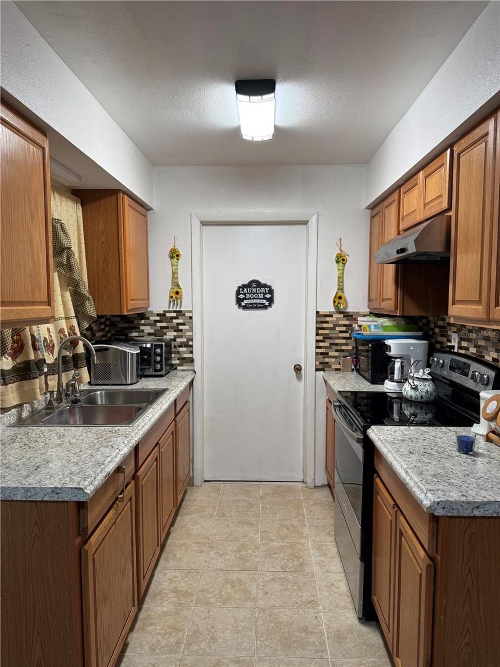 Photo of 2209 Mitch Ct E., Sanford, FL 32771 (MLS # O6367229)