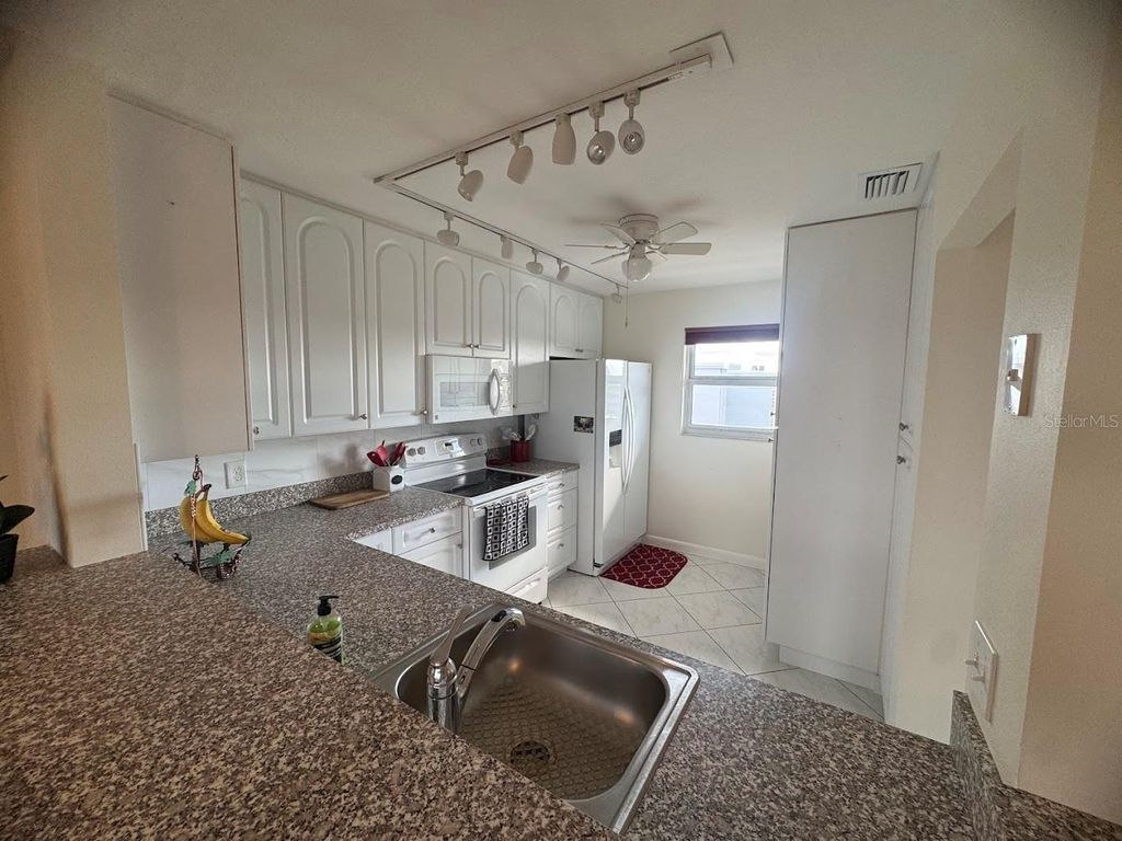 Photo of 3840 Ironwood Lane #506H, Bradenton, FL 34209 (MLS # A4668170)