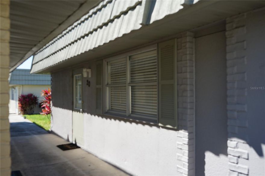 This fully furnished condo is looking for a long term tenant in this age restricted actv adlt community called Kings Point. We have 1 assigned parking space and a short walk takes you to the front door. The living and dining space are shared with the kitchen right here as well for easy access to everything. There are 2 bedrooms and 2 full baths. One has a walk in shower and the other with a tub shower combo. The primary bedroom has a walk in closet and the guest bedroom takes you out to a large glass enclosed lanai where you enjoy the sunsets over the pond. The washer and dryer are out here so you can bird watch while doing your laundry. You can walk or ride a bike to the main clubhouse where everything happens including the pool and fitness center. There are plenty of clubs to join, bus trips, golf or beaches from here we are located. Come and take a look to see what you are missing.