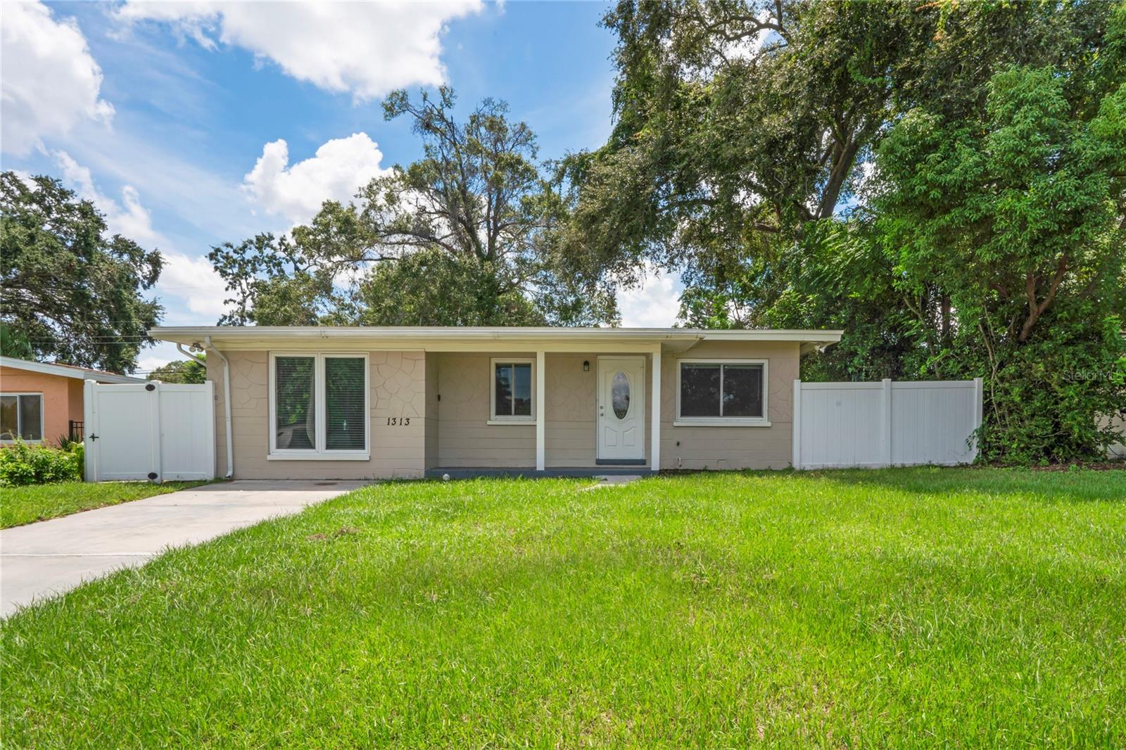 Welcome to 1313 Barry St, a 3-bedroom, 2-bathroom home nestled in the heart of Clearwater. This inviting residence offers a perfect blend of comfort and convenience, making it an ideal choice for families, first-time homebuyers, or anyone looking to embrace the Florida lifestyle. The home features a spacious and bright open floor plan with abundant natural light throughout, creating a welcoming atmosphere for everyday living and entertaining. The recently renovated kitchen is a standout, complete with modern appliances, sleek cabinetry, and plenty of counter space for all your culinary needs. Step outside to your private backyard oasis—perfect for relaxing or hosting gatherings with friends and family. With a large yard offering endless possibilities for gardening or future enhancements, the outdoor space truly complements the home. Located just minutes from Clearwater’s vibrant downtown, this property provides easy access to beautiful beaches, parks, shopping, dining, and entertainment, offering the best of both quiet residential living and nearby amenities. Additional highlights include a newer roof & HVAC system, updated plumbing, and a one-car garage for added storage space. Whether you're drawn to the beach, outdoor activities, or simply enjoy the tranquility of a friendly neighborhood, 1313 Barry St has something for everyone. Don’t miss out—schedule a showing today to see all that this fantastic property offers!