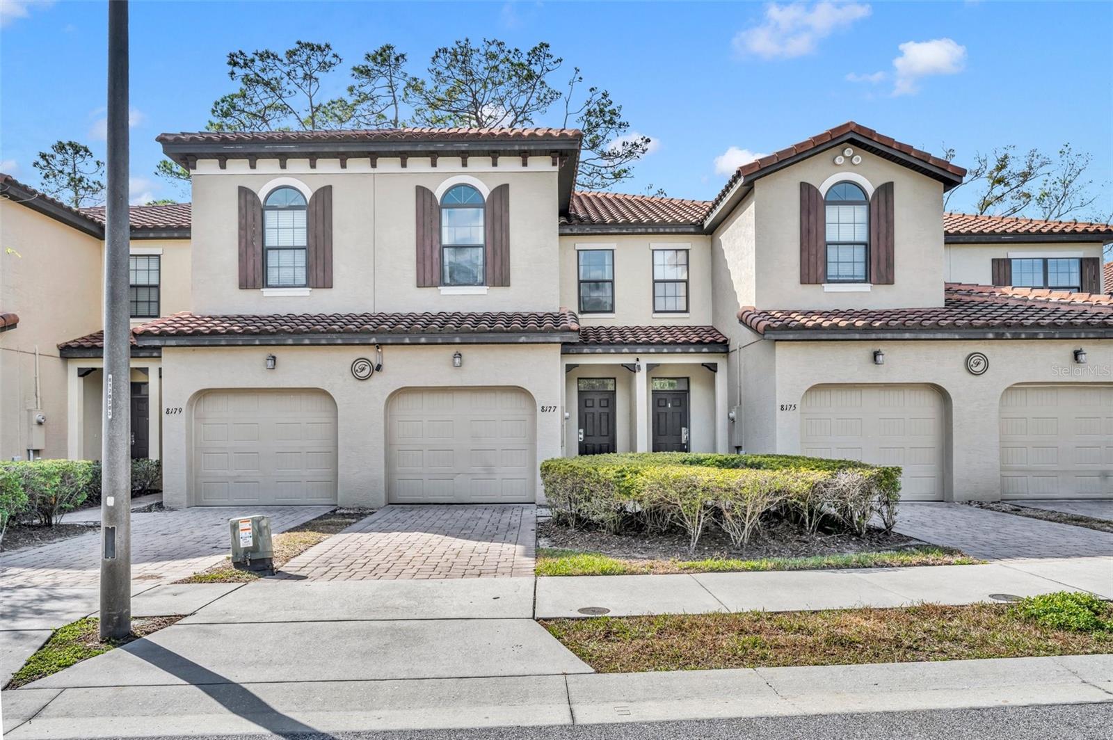 Welcome to this charming 3 Bed /2.5 Bath Townhouse in the Fountains, one of the sought after community in Championgate. Fully furnished and professionally decorated, this residence is a perfect for either a vacation home or investment as an Airbnb rental to generate revenue wile not using it. The open-concept floor plan include a bright and spacious living area that flows into a modern kitchen featuring stainless steel appliances, granite countertops and stylish backsplash. New water-proof vinyl flooring is installed throughout the house for comfort and easy cleaning. The rear patio create a calm and relaxing space with great view of consecration area that embrace natural scenary. The master bedroom offers a serene retreat with a large walk-in closet and an ensuite bathroom with dual sinks. This community is gated for privacy and features a fitness center, resort style swimming pool and spa. HOA includes water, high speed internet, cable tv and ground maintenance. With easy access to I-4, this townhome becomes a sanctuary for those seeking proximity to Orlando's renowned theme parks, including Walt Disney World and Sea World. It's also in close proximity to shopping centers, popular attractions, and golf course, making it an ideal choice for those seeking both comfort and convenience. Schedule a private showing today and make this beautiful home your new residence... Matterport 3D tour is available in Zillow and MLS and provide accurate room measurements.