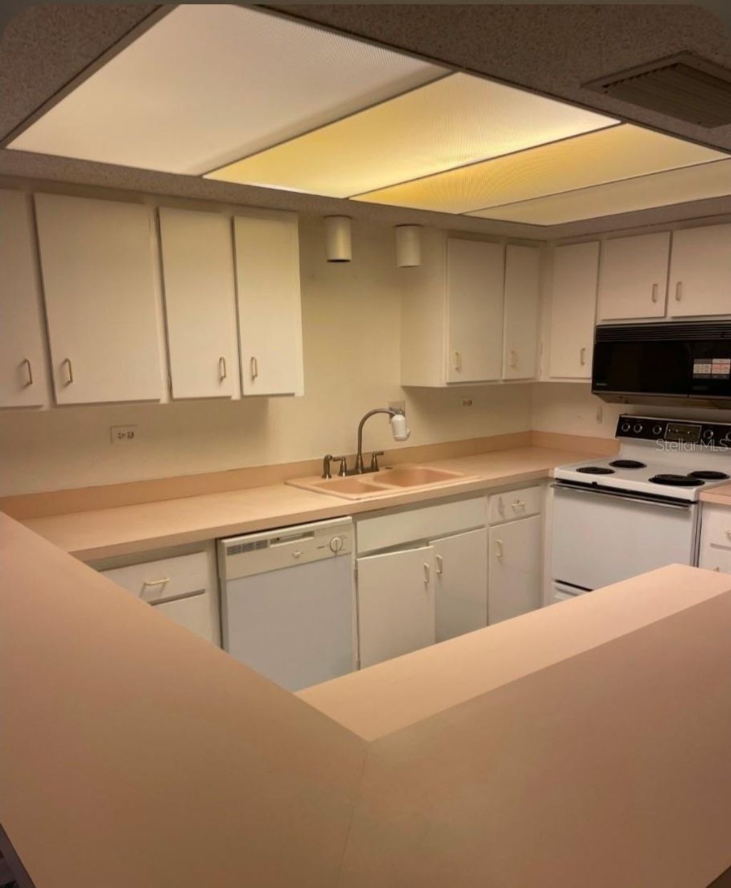 Photo of 450 Treasure Island Causeway #310, Treasure Island, FL 33706 (MLS # TB8458569)