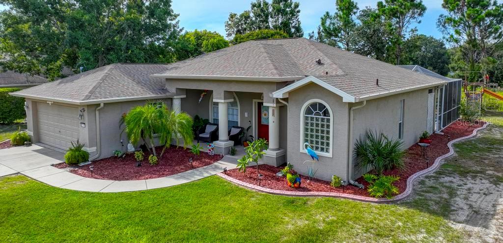 LAKEFRONT with NO HOA.... Completely Remodeled Stunning 3/2/2 Pool Home with the finest quality finishes throughout, No Expense Spared! A commanding curb appeal with a manicured garden is just the beginning with a spacious decking entryway, brand new roof with seamless gutters & gorgeous leaded glass doors. The chefs of the family will be super excited and in love with the brand new spacious kitchen featuring brand new custom cabinetry, Brazilian Quartz Natural Stone 4 x 11 breakfast bar and counters, sleek SS upgrades full appliance package, new light fixtures, sink and faucet, kitchen ceiling trim detail, new & elegant designer back splash and new gleaming porcelain tile floors throughout. BOTH BATHROOMS are FULLY REMODELED. New, New and more New!! Updated fans & light fixtures, custom mirrors, new hardware, gorgeous frameless shower doors, freshly painted interior and exterior, sleek epoxy garage floor and sooooo much more !!!! The master bedroom is super spacious with his & hers walk-in closets with access to covered lanai and a massive master retreat features opulence beyond compare with garden Jacuzzi tub, his & hers stone sinks and counter, brand new tiled shower and frameless shower doors & a stunning separate new shower stall. The open floor plan features 10' ceilings, spacious great room and dining room, and a light & bright family room with views of the enchanting lake & pool. The outdoors offers the ultimate privacy with a large pool deck, and a private yard with exotic landscaping on the lake. This home is model perfect and in absolute move-in mint condition, friendly neighborhood, close to all commerce and the best Elementary school. This house comes with a REDUCED RATE as low as 5.875 (APR 6.215) as of 08/08/2025 through List & Lock™. This is a seller paid rate-buydown that reduces the buyer’s interest rate and monthly payment. Terms apply, see disclosures for more information.