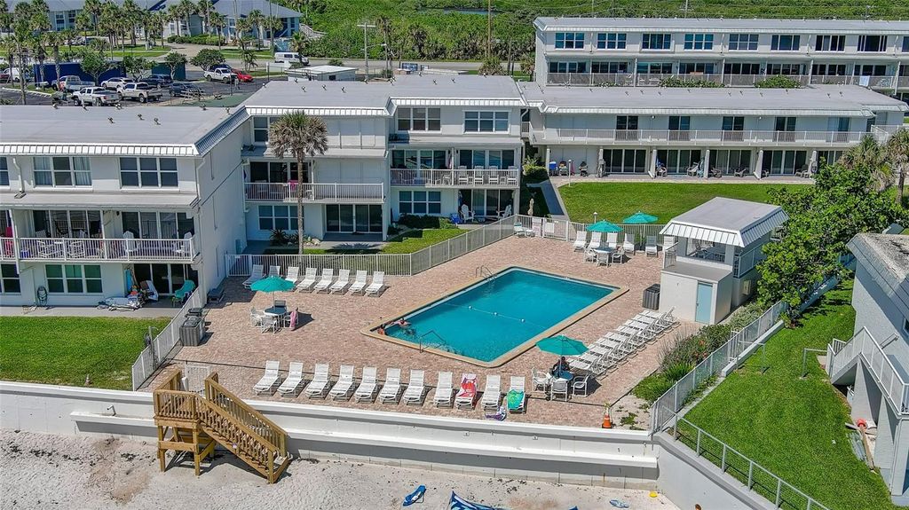 Photo of 4849 Saxon Drive #C102, New Smyrna Beach, FL 32169 (MLS # NS1087213)