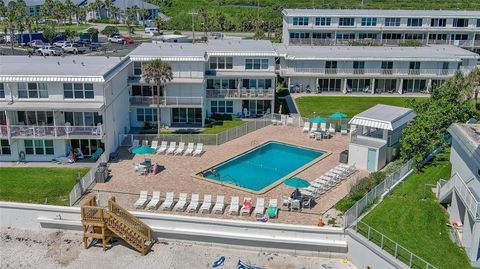 Photo of 4849 Saxon Drive #C102, New Smyrna Beach, FL 32169 (MLS # NS1087213)