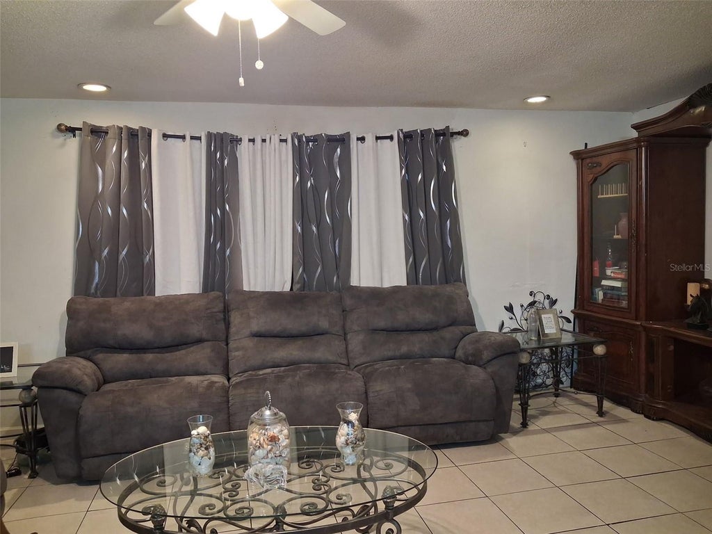 Photo of 1734 Blossomwood Lane #B, Orlando, FL 32818 (MLS # O6452637)