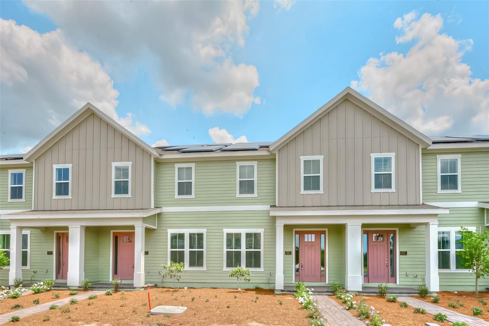 Dreamfinder’s 4-bedroom townhome located in the anticipated Weslyn Park Community at Sunbridge! Highly desired Vista Floorplan with OVER 30K OF MODEL UPGRADES! The unique design of this home offers an open space concept featuring the GOURMET KITCHEN PACKAGE with 42' UPGRADED CABINETS, Stainless Steel Appliances with Built-in Microwave/Oven and VENT HOOD, and CALCATTA QUARTZ COUNTERTOPS. This kitchen is perfect for entertaining! UPGRADED TILE FLOORING throughout the living areas. Guest bedroom and bath located on the first floor. The second floor highlights the master bedroom and heavily upgraded en-suite bathroom, secondary bedrooms, shared bath, and laundry room. Master bath includes upgraded cabinets, quartz countertops, Moen faucet package, Heavy Glass shower enclosure, and much more! The master-planned community of Weslyn Park at Sunbridge is the kind of neighborhood where herb gardens and parks invite quiet reflection. Spend your free time connected to nature on the walking/cycling trails, by the pool or at the Marina fishing or canoeing. This home has been built to impress and will not last long, schedule your appointment today!
