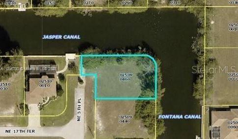 Amazing Opportunity in Cape Coral!
Corner lot with over 11,000 SF, located in the NE Cape Coral area, surrounded by a rapidly growing residential neighborhood. Just minutes away from shopping centers, supermarkets, pharmacies, and restaurants. Featuring a water canal in front, perfect for building your dream home in one of the most desirable areas of Cape Coral. Great potential for investment or future development!