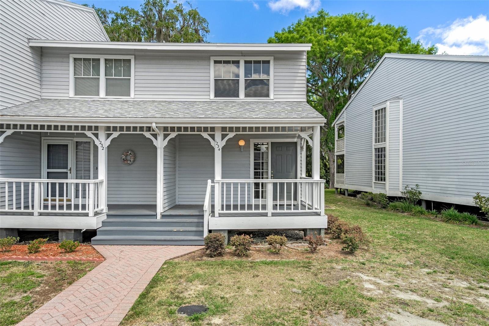Auction Property. EVERYONE WELCOME TO BID...THIS LIVE AUCTION SALE IS HELD AT THE PROPERTY ON SATURDAY, SEPTEMBER 27th, 2025, at 11:00 am. Preview from 10:00 am. on sale day. Because this is an auction sale, the home may sell for less or more than the list price. The seller would consider selling prior to the auction. If you are interested, please reach out. Seize this incredible opportunity to own a highly desirable end-unit townhouse with direct waterfront views on the Tsala Apopka Chain of Lakes! Whether you're searching for a profitable short-term rental, a peaceful vacation home, or a full-time residence, this 2-bedroom, 2.5-bath property offers the perfect blend of comfort, style, and income potential. Recently updated with luxury vinyl plank flooring, modern appliances, and fresh paint, this two-story unit is ready for immediate move-in or rental. The open-concept living space features large sliding glass doors that showcase stunning water views, seamlessly blending indoor and outdoor living spaces. A stylish kitchen with ample storage and a breakfast bar makes hosting guests a breeze. Upstairs, the spacious owner’s suite features a private balcony where guests can sip coffee while overlooking the serene canal. The screened-in back porch provides another relaxing space—perfect for unwinding, fishing, or spotting local wildlife. Plus, the charming front porch adds even more curb appeal. This low-maintenance property is ideal for investors, with a new roof provided by the HOA and access to sought-after amenities, including a sparkling pool and a private boat ramp. Guests can enjoy boating, fishing, and exploring the breathtaking Florida outdoors right from the backyard. Located just minutes from shopping, dining, hospitals, parks, and Rails-to-Trails, this home is in a prime location for short-term renters seeking adventure and relaxation. Don't miss your chance to own a turnkey waterfront rental with incredible earning potential!......BUYER will receive a general warranty deed free and clear of all debts, guaranteed with a title insurance policy at closing.... 4-point Inspection Available.