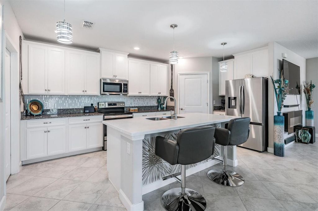 Photo of 10397 Echo Dock Loop, San Antonio, FL 33576 (MLS # TB8461670)