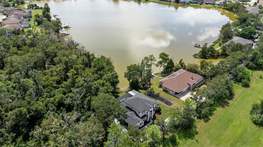 Photo of 6814 Magnolia Point Drive, Land O Lakes, FL 34637 (MLS # TB8429944)