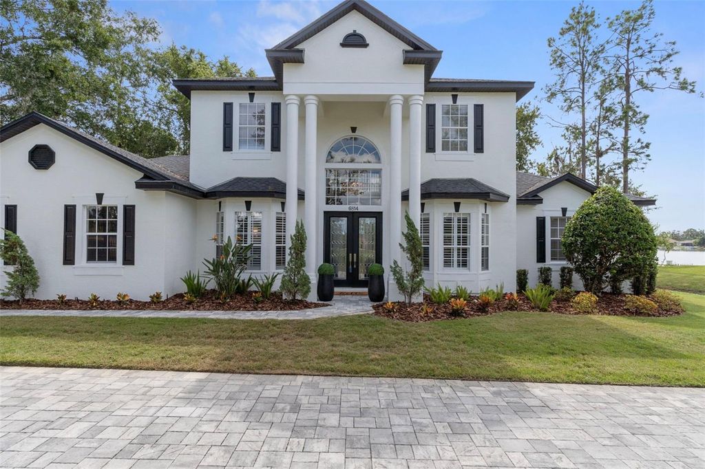 Photo of 6814 Magnolia Point Drive, Land O Lakes, FL 34637 (MLS # TB8429944)