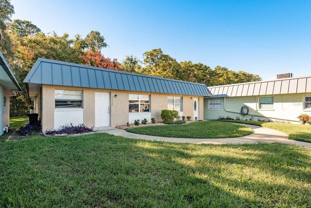 Photo of 11737 Bayonet Lane #A, New Port Richey, FL 34654 (MLS # W7881709)