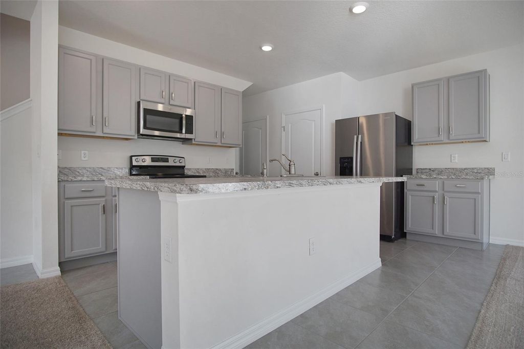 Photo of 736 Brooklet Drive, Davenport, FL 33837 (MLS # S5140747)