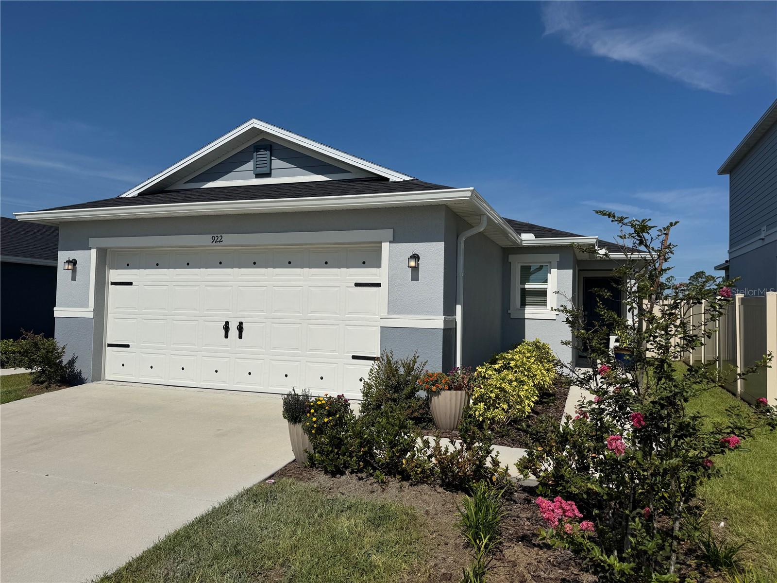 Welcome to this beautifully modern constructed 2024 single-family ranch home located in the desirable Hickory Ranch community of Auburndale. This 3-bedroom, 2-bath residence offers a fully fenced yard with lush, well-maintained landscaping and soaring vaulted ceilings throughout the main living area. This home is equipped with solar panels for improved energy efficiency and lower utility costs, along with a whole-home water filtration system that adds an extra layer of comfort and quality.
Step into a spacious open-concept floorplan centered around a large kitchen island with bar seating—ideal for entertaining or casual dining. The kitchen features crisp white shaker cabinets, elegant stone countertops, and stainless-steel appliances including a bottom-freezer refrigerator, glass-top range, over-the-range microwave, dishwasher, and a pantry. Recessed lighting adds a modern touch throughout.
The primary suite offers a peaceful retreat, complete with a walk-in closet and a private ensuite bath with stylish finishes—perfect for comfort and privacy. The secondary bedrooms are generously sized, offering flexibility for guests, a home office, or additional living space.
Ceramic tile flooring runs through the main living areas and wet zones, while the bedrooms are carpeted for added comfort. Washer and dryer hook-up.
Enjoy the outdoors in the screened-in lanai overlooking the large backyard—ideal for relaxing evenings or weekend gatherings.
The home is currently tenant-occupied until August 31st. Please do not disturb the tenant without a scheduled appointment. The property is also under camera surveillance.
Conveniently located just minutes from I-4, the Polk Parkway (570), and US-92, this home offers easy access to Lakeland, Orlando, and surrounding areas—making it an ideal location for both commuters and families.