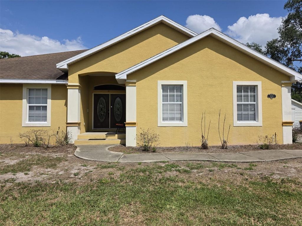 Photo of 3906 Winchester Road, Lakeland, FL 33811 (MLS # TB8502927)
