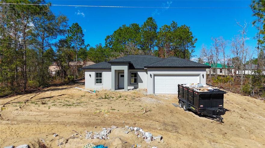 Under Construction. NEAR THE GOLF CLUB!!! This brand-new home features 4 spacious bedrooms and 2 full bathrooms, offering a comfortable and modern layout. The open-concept kitchen comes fully equipped with all kitchen appliances. The home also includes a 2-car garage, providing ample parking and storage space.

Conveniently located, the property is near a golf club, a wildlife management area, and the Marion County Airport, offering a great balance of recreation, nature, and accessibility. Built with quality finishes and designed for convenience, this home is made for homeowners or investors looking for a new construction opportunity in Ocala.