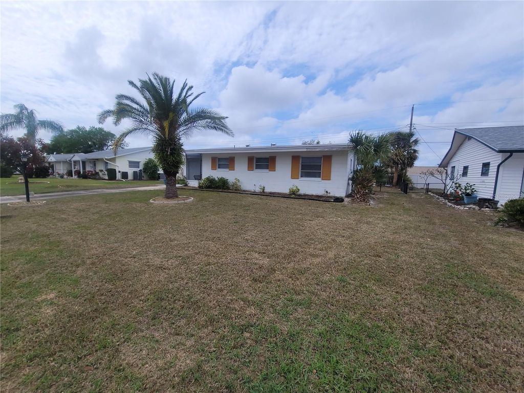 Photo of 823 La Jolla Avenue, Sun City Center, FL 33573 (MLS # TB8358779)