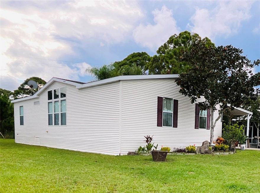 Welcome Home! Discover this beautiful 2005 Palm Harbor 2 bedroom, 2 bathroom home located on a spacious 100'x57' lot in the desirable Terra Mar Village Riverfront Community.  NEW ROOF COMING SOON!  This home features vaulted ceilings, crown molding, oversized windows, & covered parking with plenty storage space.  The open split floor plan includes a formal dining room, large eat-in kitchen with contemporary cabinetry, dishwasher, garbage disposal and even a built-in desk space.  Seller is offering a $1,000.00 credit to buyer for flooring in Primary.  Step directly from the kitchen into a screened patio perfect for entertaining or relaxing.  Terra Mar Village offers resort-style amenities, included 2 saltwater pools, a clubhouse, shuffleboard, bocce courts, basketball, barbeque area,  boat ramp, and a fishing pier. Catch a rocket launch from your front yard or the community pier.  Boat lifts are also available to residents for an additional fee.  Storage space is also available for a separate fee.  Enjoy direct riverfront access to the Intracoastal Waterway, a true Florida lifestyle!  Close to shopping, beaches, parks, trails, Port Canaveral only an hour drive, Daytona International Speedway & Airport 30 minute drive, I-4 30 minute drive, I-95 15 minute drive.  All information is deemed accurate but not guaranteed.