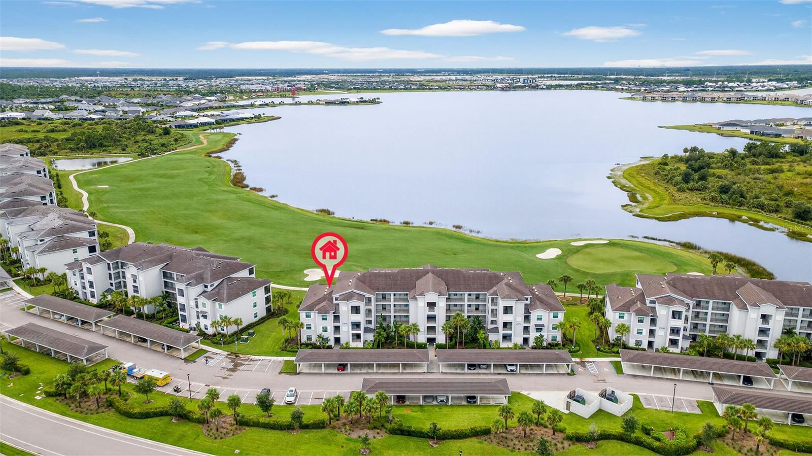 This is your opportunity to embrace year-round golf in a top floor end unit at Babcock National! GOLF MEMBERSHP INCLUDED! Just bring yourself and your suitcase because this condo is being sold turnkey-furnished. This layout is known as the "Birkdale". This model comes with 2 bedrooms, 2 bathrooms, about 1,200 square feet of living space, an exterior storage unit AND a 1-car covered parking space. Additionally, this unit is accessible by the stairs or the elevator. Walking inside, you'll instantly be greeted by a spacious layout and attractive finishes. Those finishes include everything from sleek granite countertops with an oversized island, smart appliances, crown molding, tile in the main areas, carpet in the bedrooms and some updated ceiling fixtures. With bay windows in the eat-in kitchen and sliding glass doors in the living room, you have the luxury of enjoying golf course & water views without even stepping outside! Down the hall, your primary bedroom offers a large walk-in closet, linen closet, and a beautifully tiled walk-in shower. On the other side of the hallway, guests can reside in their own spacious room with it's own nearby bathroom. The best part? Being on the top floor and offers the luxury of panoramic views overlooking Lake Babcock AND the golf course from your screened in lanai! Enticing, wouldn't you agree? Within the community, you have an array of amenities at your fingertips. There's the 18-hole championship golf course, resort-style pool with lap lanes & a spa, tiki bar, pickleball & bocce courts, a state-of-the-art fitness center, tennis center, a clubhouse w/ dining, and more. Not only that but Founder’s Square within Babcock Ranch, hosts food trucks with entertainment, markets, music, etc. Living at Babcock means more than just residing—it's a vibrant lifestyle. Your neighbors are waiting! Come check out what the community and lifestyle is all about!