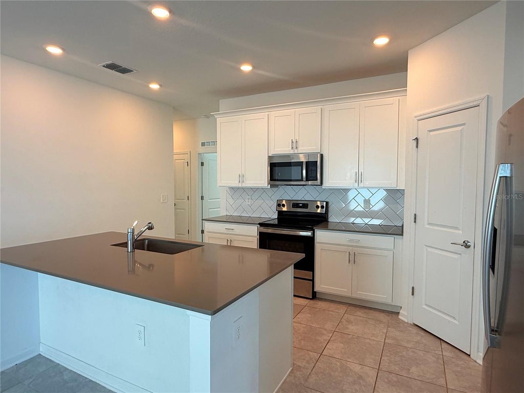 Photo of 1945 Heart Lake Drive, Groveland, FL 34736 (MLS # O6450723)