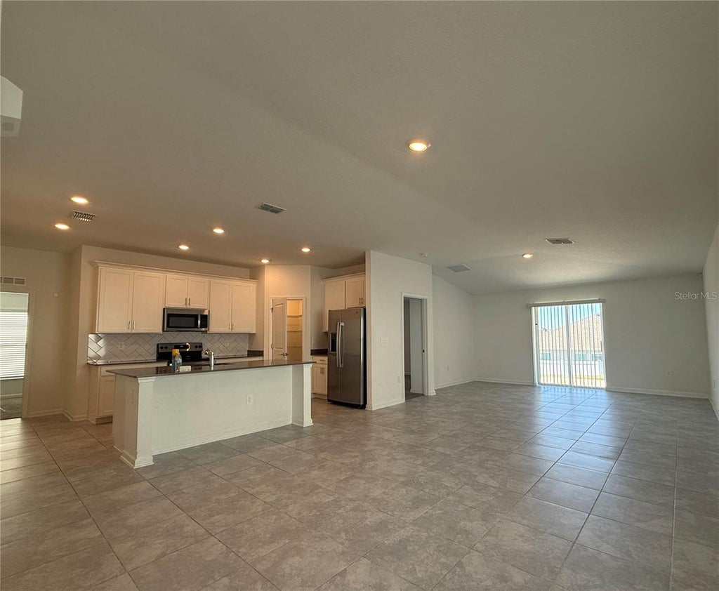 Photo of 1945 Heart Lake Drive, Groveland, FL 34736 (MLS # O6450723)