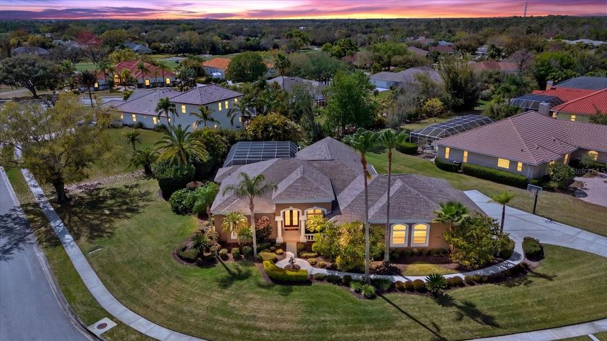 Situated on a spacious .57-acre lot in the sought-after River Club community, this recently updated home offers privacy, flexibility, and exceptional indoor-outdoor living. Known for its central location, spacious homesites, distinctive architecture, low HOA fees, and no CDD, River Club remains one of the area’s most desirable neighborhoods. A spacious driveway and long walkway lead to the welcoming front entrance featuring double glass doors with a transom window, creating an elegant first impression. Offering 3,622 square feet of living space, the home features 5 bedrooms, 3.5 baths, plus a large bonus room that could easily serve as a 6th bedroom, office, or home gym, along with multiple living and entertaining areas designed for comfort and functionality. Inside, the home showcases thoughtful architectural details, including custom built-ins in the dining and family rooms, adding both character and functionality. The fully updated kitchen serves as the heart of the home and has been enhanced with new lighting fixtures and modern finishes. An eat-in kitchen area and spacious family room overlook the lanai, while oversized sliding glass doors in the living room and family room create seamless indoor-outdoor living and allow natural light to fill the space. Step outside to a private backyard retreat featuring a heated pool and spa with a BRAND NEW heater and pump surrounded by lush landscaping for added privacy. The expansive screened lanai is designed for entertaining with an outdoor kitchen, generous seating areas, and ample deck space, making it easy to enjoy Florida living year-round. The interior has been refreshed with new baseboards and fresh paint, and recent updates include the pool resurfaced in 2024 and lanai rescreened in 2024, along with new lanai doors installed in 2026 and a replaced garage door motor. The property also features a laundry room, air conditioned storage room, oversized three-car garage, mature tropical landscaping, and the space and privacy that come with a large corner homesite. With its sizable lot, thoughtful updates and architectural character in the desirable River Club community, this home offers a rare combination of space, comfort, and lifestyle.