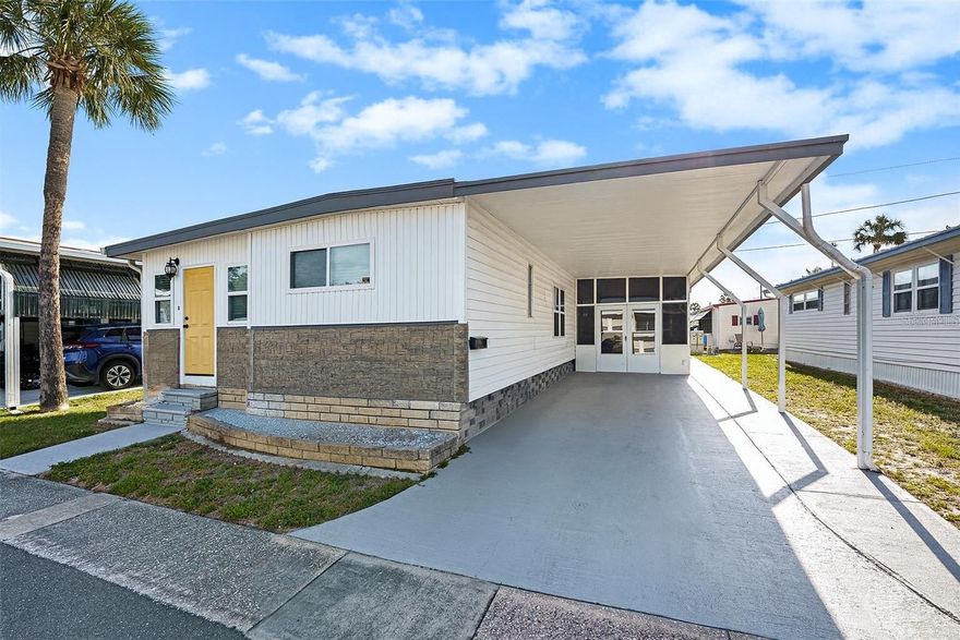 Welcome to your slice of paradise in the desirable Sunset Palms 55+ community of Pinellas Park! This charming two-bedroom, two-bathroom mobile home offers a delightful Florida lifestyle with numerous updates and fantastic amenities. Step inside through the inviting yellow front door and be greeted by a formal dining room, perfect for entertaining. Beyond lies a spacious great room, seamlessly blending the family/living area with an open kitchen featuring a cozy dinette. This home boasts significant upgrades for peace of mind, including new hurricane-rated windows and doors, a new membrane roof, and a new AC system. The exterior features attractive vertical cream siding accented by stylish stone fascia. Price includes the Share (valued at $55,000).

Enjoy the Florida sunshine in the expansive, covered sunroom located on the right side of the home. Complete with ample seating and a complimentary grill, it’s an ideal spot for relaxation and gatherings. Just beyond the sunroom, you'll find a convenient storage room equipped with a washer, dryer, and secondary refrigerator.

The two well-appointed bedrooms are situated on opposite ends of the home, each offering a private full bathroom for added comfort and privacy. The entire home is beautifully furnished and decorated with a serene beachy coastal theme, and the best part? It all conveys with the property – every piece of furniture and all the housewares are included!

Sunset Palms is a vibrant 55+ community offering an incredibly low monthly fee of just $183.05, which covers water, sewer, trash, and access to a wealth of amenities. Take a dip in the heated pool and spa, stay active in the fitness center, socialize in the clubhouse with fully funded escrows, browse the library, enjoy a game of billiards or shuffleboard, or relax by the small scenic lake. The community also offers a convenient laundry facility and even a private gated entrance to Super Walmart.   

Perfect for snowbirds or those seeking a seasonal retreat, Sunset Palms allows seasonal rentals (no annual rentals). This fantastic location is just minutes away from the stunning Gulf beaches, a wide array of top-notch dining and shopping options, convenient access to airports and I-275, and so much more. Don't miss this opportunity to embrace comfortable, affordable, and convenient Florida living.