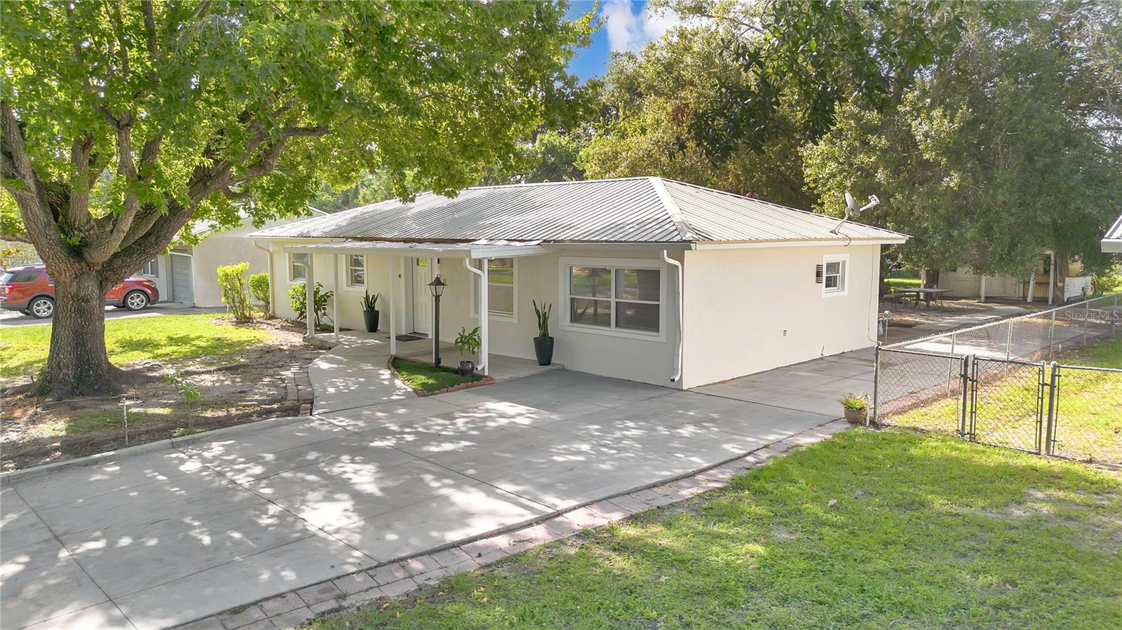 One or more photo(s) has been virtually staged. Move in ready, great location, 5 minutes to Downtown Winter Garden, property offers 4 bedrooms 2 bedrooms, metal roof, huge back yard,No HOA, a gazebo. Walking g distance to elementary school. Close to major Roads, highways, hospitals, shopping centers, restaurants.