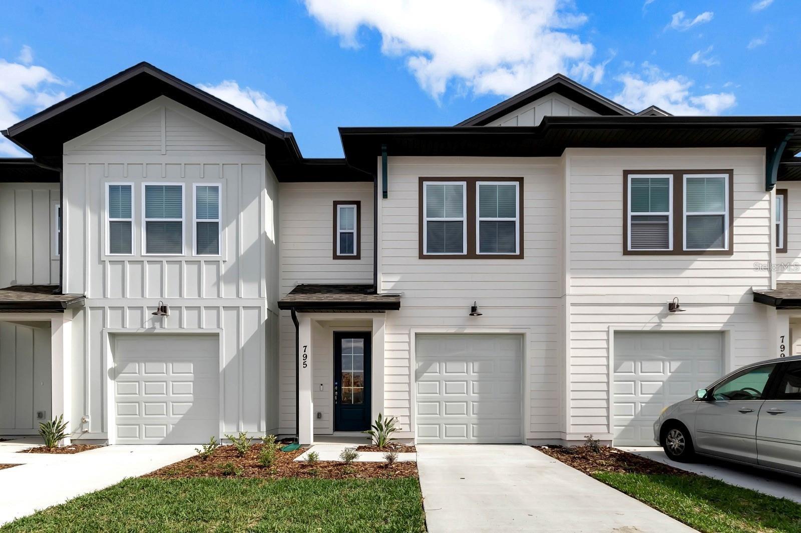 FURNISHED. This stunning, recently-built property its close proximity to the world-famous Disney parks, which draw visitors throughout the year. This 3 bedroom, 2.5 bathroom townhome with an attached one car garage is located in the highly desirable community of Festival at Enclaves. You will be just minutes from Posner Park, Champions Gate Village and Walt Disney World. Upon entering, you'll be greeted by an open floor plan, this space includes the kitchen, dining area, and living area. This beautiful kitchen has upgraded quartz countertops, the island includes accent navy blue cabinets, and gold hardware throughout the house. Upstairs you will see the master bedroom has a walk-in closet, dual vanity sink, and gorgeous shower. The additional bedrooms will be separated from the master, with a bathroom, and a laundry room. This is the perfect floor plan for any family looking to be close to all that Orlando has with convenient access to I-4, SR429 and SR417. It can be subleased for short term with owner approval and extra monthly fee.