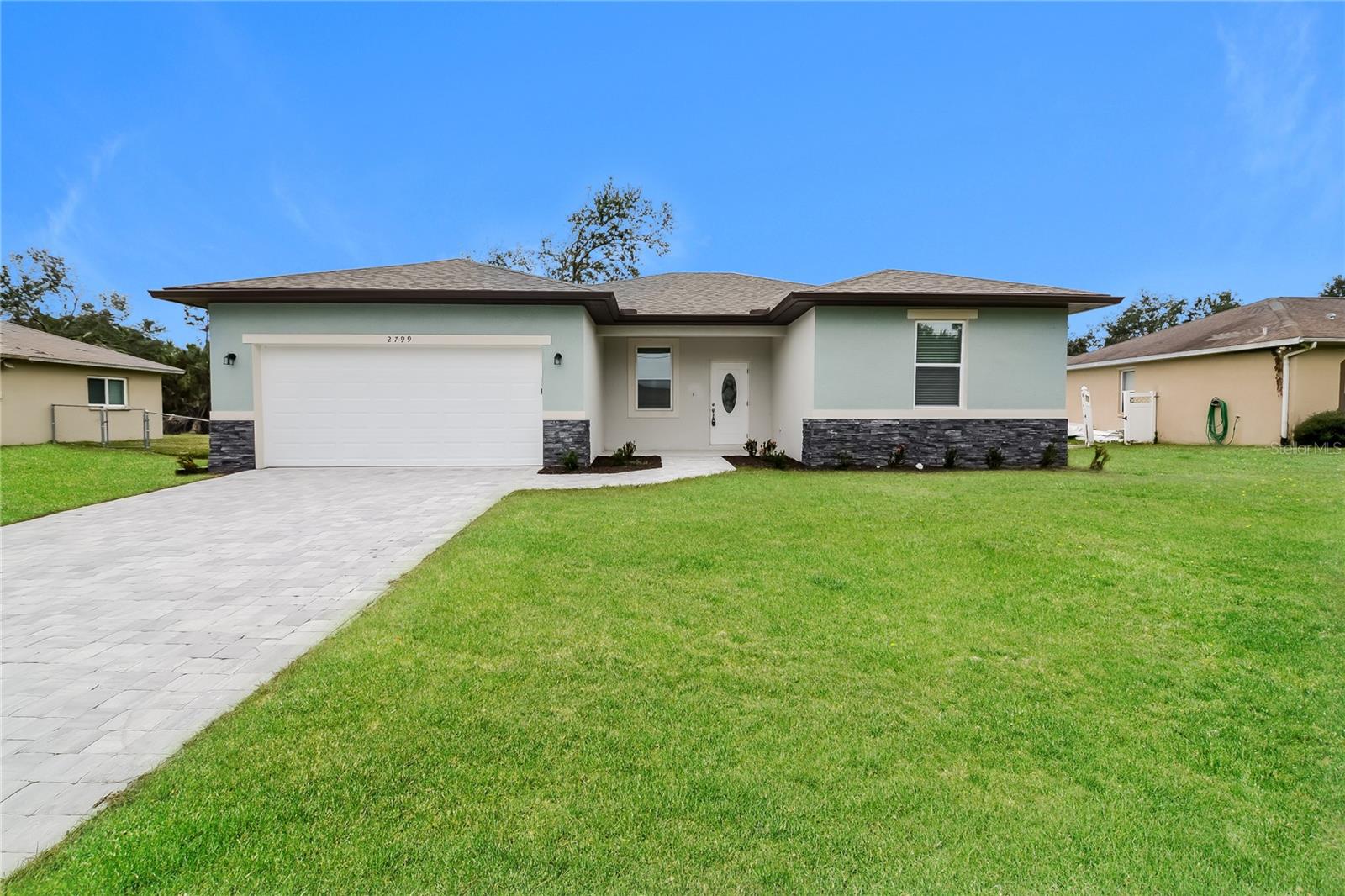 This updated 3-bedroom, 2-bath home is move-in ready and has a great open layout. The kitchen comes with granite countertops, stainless steel appliances, and a breakfast bar that connects seamlessly to the living and dining areas. Durable vinyl flooring runs throughout, creatinf a bright and clean atmosphere. Situated on a quiet street with convenient access to shopping, schools, and more. Vacant and easy to show!