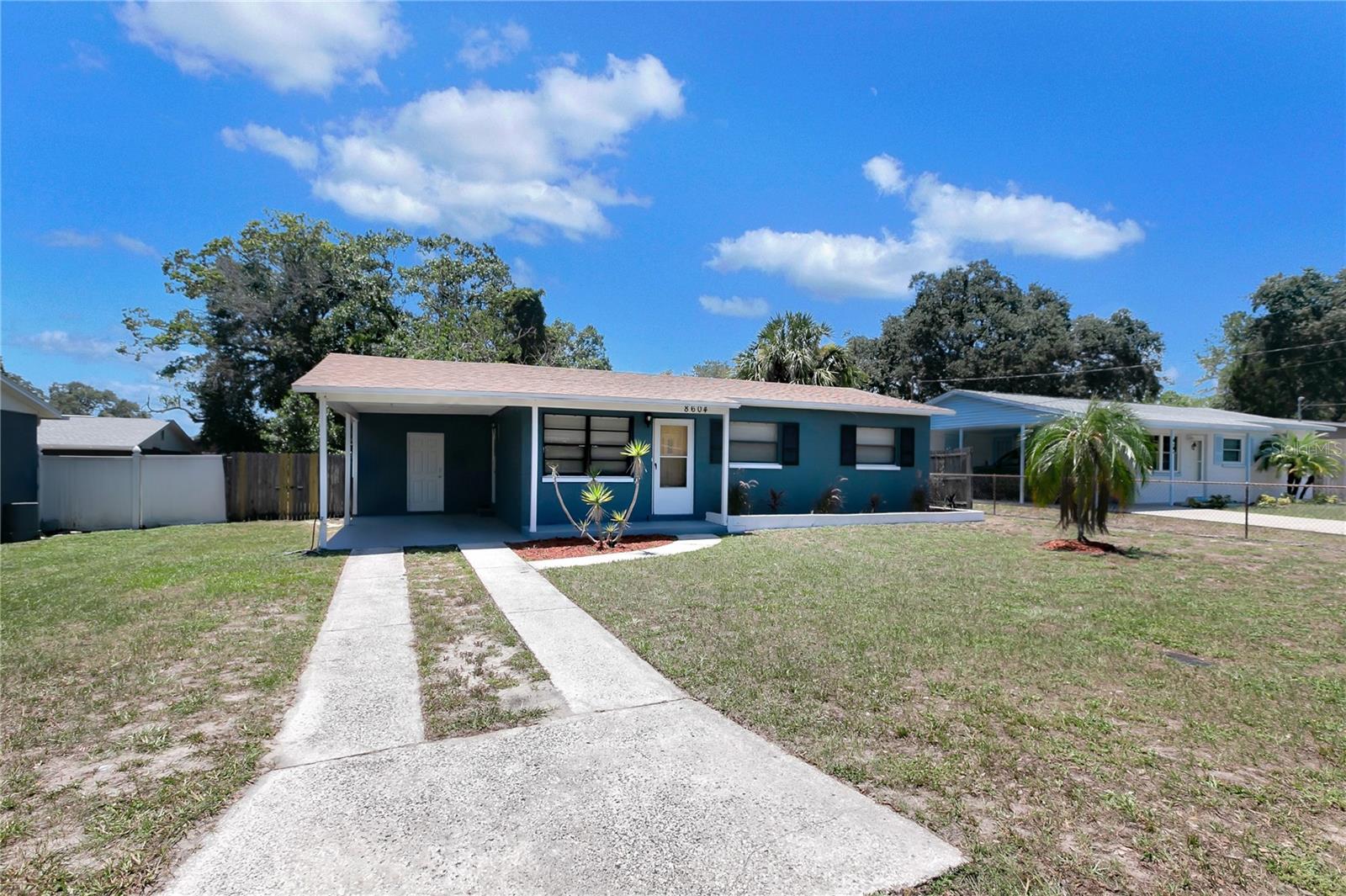 You'll love this 3/1 move in ready home with a carport. Includes an updated kitchen with a built in microwave and granite countertops. New paint throughout and hardwood floors in the bedroom. Bathroom was recently done with a push flush toilet. Enjoy the privacy of a fenced in backyard. This house won't last long. Contact us to schedule a viewing today!