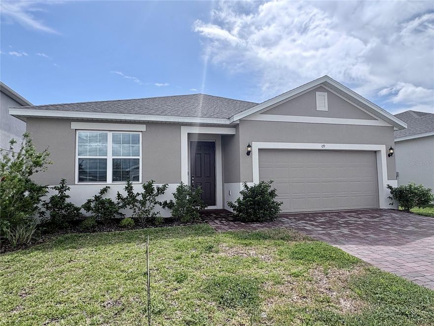 Beautiful and move-in ready, this 4-bedroom, 2-bath home in the Marion Ridge community offers a bright open-concept layout with a modern kitchen featuring 42” cabinets, quartz countertops, tile backsplash, and stainless steel appliances. The primary suite provides comfort and privacy, while the additional bedrooms and flexible space for guests or work. A spacious backyard and a covered lanai with pavers create the perfect outdoor area to relax or entertain. With nearby green spaces and a community playground, this home is the ideal blend of warmth, modern comfort, and convenience. Schedule your private tour today.