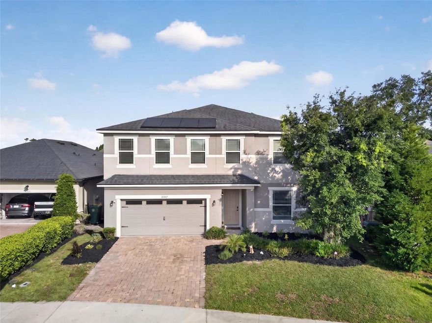 One or more photo(s) has been virtually staged. tunning  spacious 4-bedroom, 2.5-bath home situated on a vast lot in the establish Brantley Green community in DeLand. Built by Mattamy Homes, this open-concept floor plan offers modern living with an eat-in kitchen featuring granite countertops, high cabinets, a large island, and plenty of space for entertaining. Ceramic tile flooring flows throughout the wet areas for style and easy maintenance. Enjoy additional living space with a downstairs flex room and an upstairs loft, perfect for a home office, media room, or play area. Step outside to a fully fenced backyard offering privacy and room to relax or entertain. The property also includes leased solar panels at $174per month, providing energy efficiency and potential utility savings. Residents enjoy community amenities including sidewalks, a pool, and a playground. Conveniently located near shopping, restaurants, and everyday essentials, this home offers the perfect combination of space, comfort, and location. Schedule your showing today!