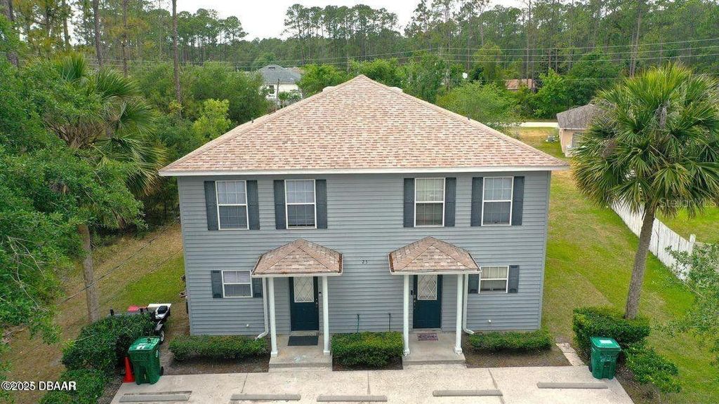 Photo of 23 Regent Lane, Palm Coast, FL 32164 (MLS # FC316075)