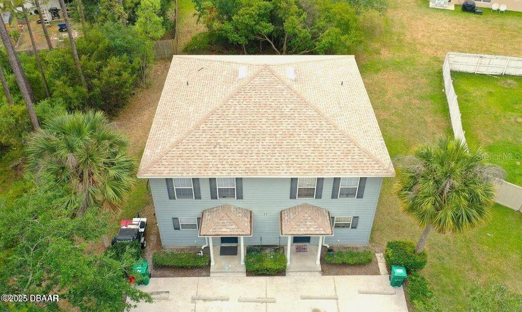 Photo of 23 Regent Lane, Palm Coast, FL 32164 (MLS # FC316075)