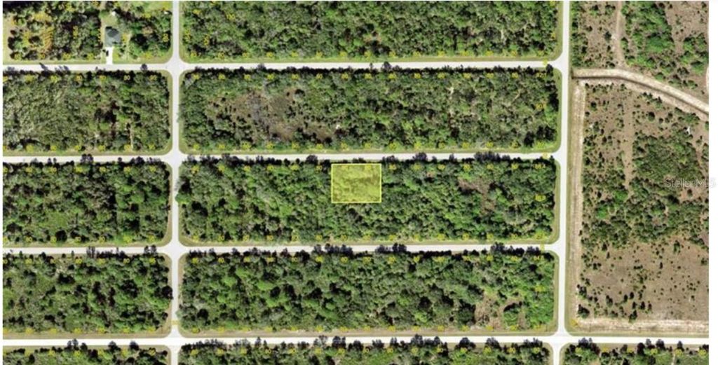 Photo of 10196 Calumet Boulevard, Port Charlotte, FL 33981 (MLS # O6328628)