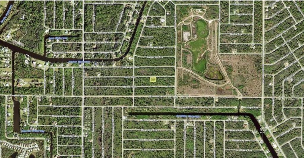 Photo of 10196 Calumet Boulevard, Port Charlotte, FL 33981 (MLS # O6328628)