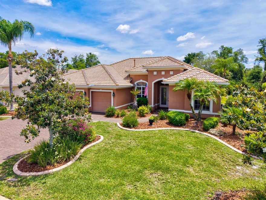 One or more photo(s) has been virtually staged. Welcome to 315 Petrel Trail — a refined estate tucked behind the gates of sought-after Greyhawk Landing, where timeless Arthur Rutenberg design meets thoughtful modern luxury. Perfectly positioned on a beautifully manicured 0.31-acre preserve homesite, this exceptional St. Tropez II model offers the rare combination of elegance, comfort, privacy, and true peace of mind.
From the moment you arrive, the home’s architectural presence is undeniable. Step inside to discover gracious formal living and dining spaces, soaring ceilings, detailed tray accents, extensive crown molding, plantation shutters, and a flowing split-bedroom layout designed for both everyday living and effortless entertaining. The expansive family room opens seamlessly to the outdoor living spaces, creating the ideal Florida lifestyle experience.
Lovingly refined and extensively upgraded, this residence offers a spacious primary suite retreat privately tucked away from the secondary bedrooms, while bedrooms two and three share a well-appointed bath. A versatile fourth bedroom or den is perfectly positioned beside a convenient full pool bath — ideal for guests, multigenerational living, or a private office.
Outside, the home truly shines. The inviting saltwater pool is designed for year-round enjoyment, complete with natural gas heating and a Pentair salt chlorine system for effortless maintenance. The outdoor kitchen and two expansive covered lanais create a private oasis overlooking a lush preserve backdrop, offering serenity and exceptional entertaining space.
This home also delivers an extraordinary level of security, efficiency, and convenience. A brand-new tile roof (2026) was recently completed and includes a transferable limited lifetime warranty, complemented by a newly installed gutter system. A 20KW Kohler whole-house generator (2019) fueled by natural gas provides seamless backup power, while smart home technology allows remote operation of the HVAC system (2020), generator, security system, Smartscape exterior lighting, and five-zone irrigation system.
Additional highlights include a spacious three-car garage with newly epoxied flooring, mature tropical landscaping, and a finished floor elevation of 20.80’, offering valuable peace of mind outside of a high-hazard flood zone.
Residents of Greyhawk Landing enjoy an exceptional amenity-rich lifestyle with miles of walking and biking trails, a beautifully updated clubhouse with fitness center, resort-style pool and spa, splash playground, tennis courts, and pickleball. Ideally located near shopping, dining, and everyday conveniences with the Marketplace at Heritage Harbour and Lakewood Ranch Main Street, and quick access to Interstate 75 for an easy commute to Sarasota and Tampa.
A home of this caliber — combining design, upgrades, technology, and location — is truly a rare offering.