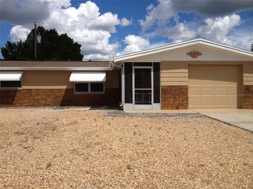 Beautifully updated 3 bedroom, 1 bath home with a 1 car garage, located in a convenient and desirable area near Pinellas. This home features elegant porcelain tile throughout, a modern kitchen with granite countertops and solid wood cabinets, and updated finishes in both the kitchen and bathroom. Enjoy a spacious living room and a separate dining area, perfect for entertaining. The fully fenced yard offers privacy and outdoor space to relax. Ideally situated close to shopping, restaurants, and everyday amenities. Don’t miss this opportunity schedule your showing today!